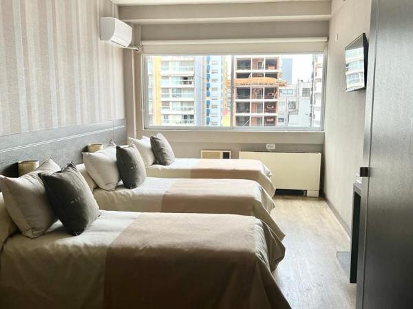 Sarum Hotel Design : photo 1 de la chambre chambre triple standard