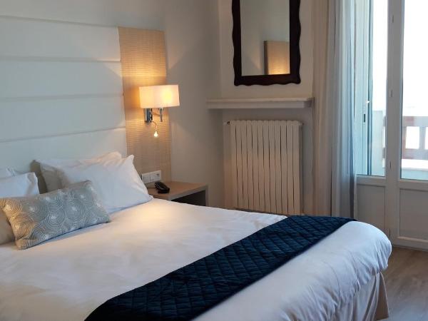 Hotel Uhainak : photo 1 de la chambre chambre double deluxe avec balcon - vue sur mer