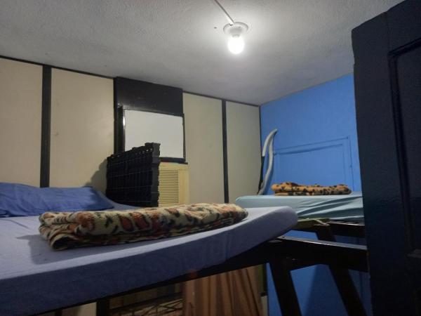 Hostel Sapucali : photo 4 de la chambre chambre triple Économique avec salle de bains commune