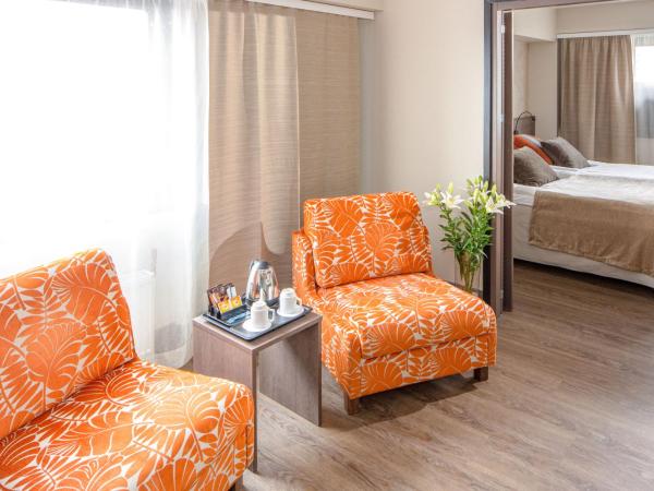 Holiday Club Turun Caribia : photo 3 de la chambre suite lit king-size