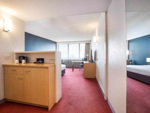 Holiday Inn Melbourne Airport, an IHG Hotel : photo 7 de la chambre chambre lit king-size premium