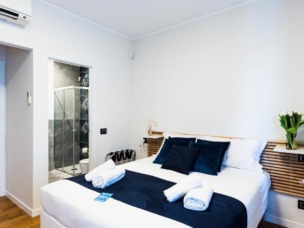 Gegix's Rooms Milano : photo 2 de la chambre chambre quadruple avec balcon 