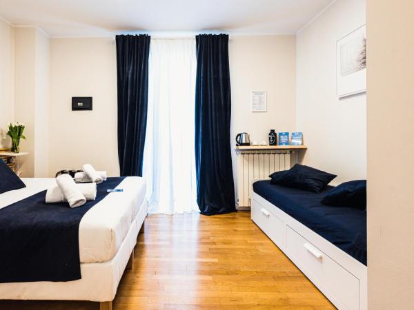 Gegix's Rooms Milano : photo 8 de la chambre chambre quadruple avec balcon 