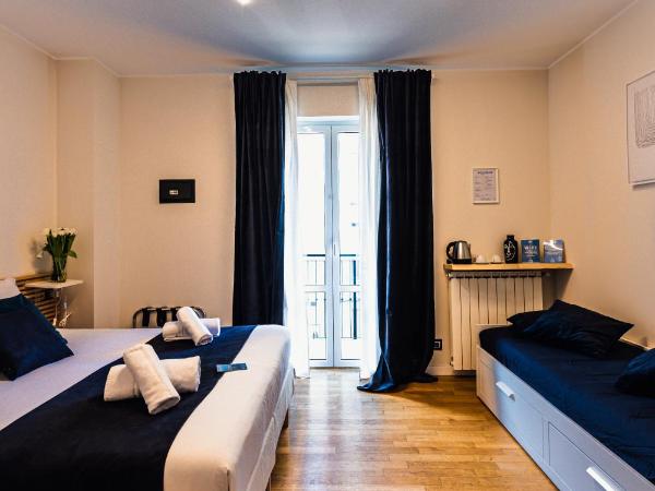Gegix's Rooms Milano : photo 10 de la chambre chambre quadruple avec balcon 