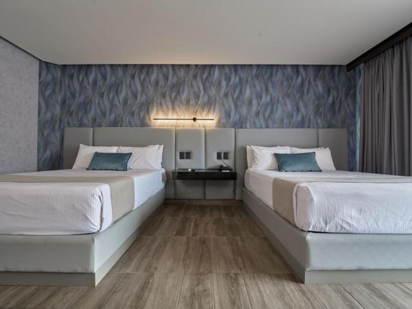 Hotel Estancia Business Class : photo 1 de la chambre suite junior