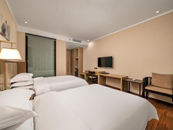 Guangzhou Boyi Hotel : photo 3 de la chambre chambre lits jumeaux deluxe