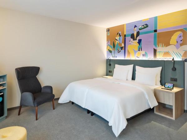 BASSENA Wien Donaustadt : photo 8 de la chambre chambre avec douche