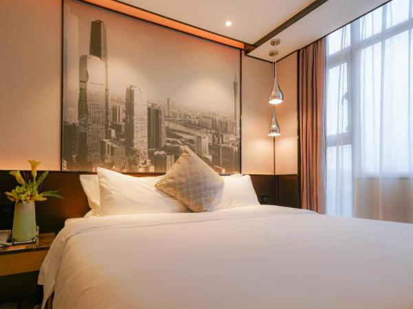 Guangdong Baiyun City Hotel : photo 1 de la chambre chambre lit queen-size deluxe