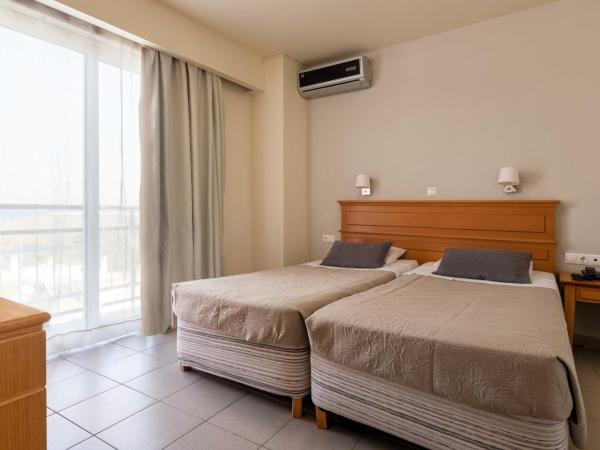 City Plus Rhodes Hotel : photo 2 de la chambre chambre double ou lits jumeaux - vue sur ville
