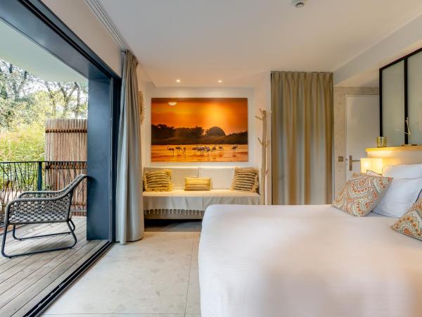 Le Lodge des Îles d'Or : photo 1 de la chambre chambre double ou lits jumeaux confort - rez-de-chaussée