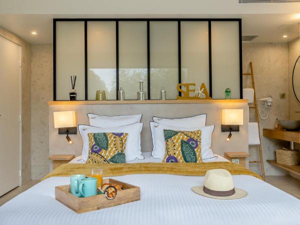 Le Lodge des Îles d'Or : photo 3 de la chambre chambre double ou lits jumeaux supérieure (À l’Étage)