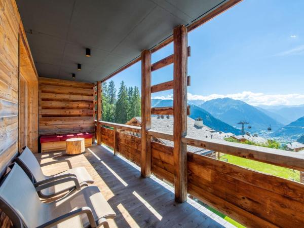 W Verbier : photo 10 de la chambre fantastique suite lit king-size avec balcon et cheminée