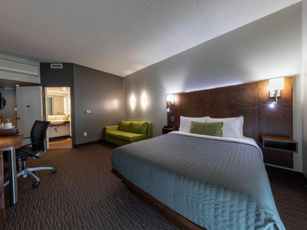 Hôtel & Suites Normandin Québec : photo 2 de la chambre chambre lit queen-size - accessible aux personnes à mobilité réduite