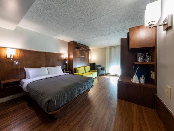 Hôtel & Suites Normandin Québec : photo 3 de la chambre chambre lit queen-size de luxe (2 adultes)
