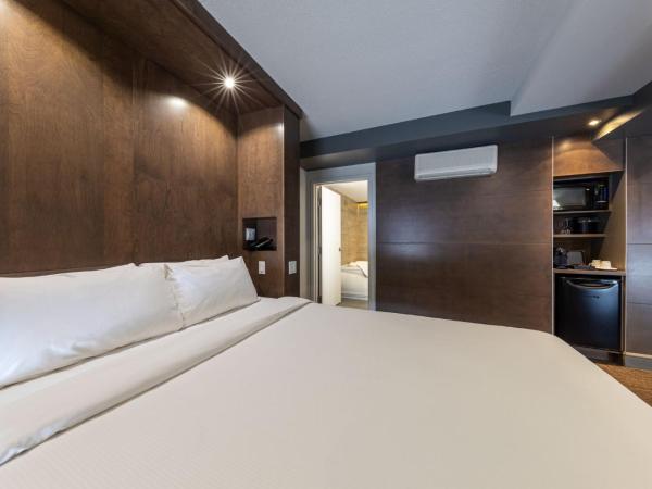 Hôtel & Suites Normandin Québec : photo 1 de la chambre studio lit queen-size de luxe