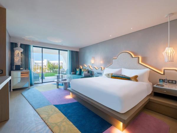 W Algarve : photo 1 de la chambre chambre lit king-size fabuleuse avec balcon et accès au jardin