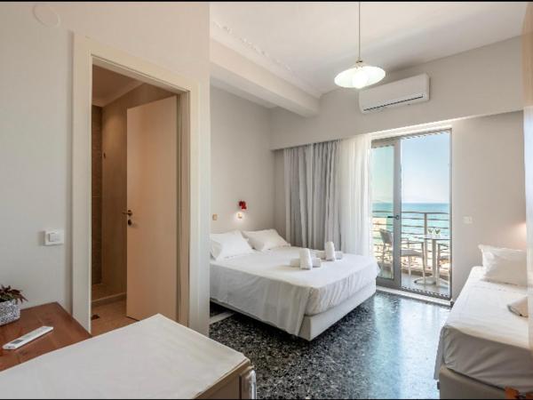 Frini Hotel : photo 1 de la chambre chambre triple standard - vue sur mer