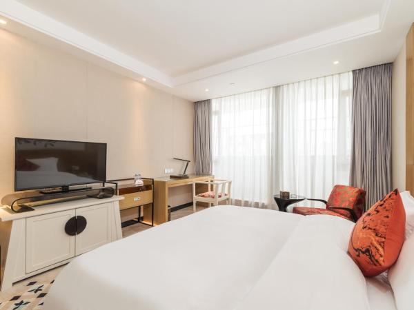 Paco Hotel Suyuan Metro Guangzhou-Free Shuttle Bus for Canton Fair : photo 4 de la chambre chambre lit king-size