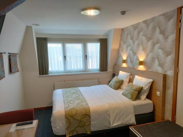 Hotel Fevery : photo 1 de la chambre chambre lit queen-size 