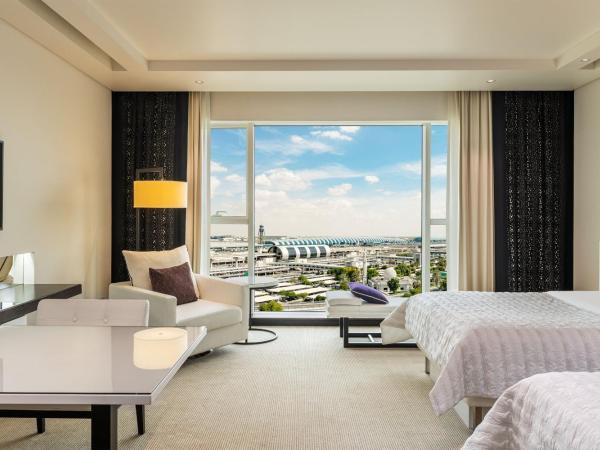 Le Méridien Dubai Hotel & Conference Centre : photo 1 de la chambre hébergement lits jumeaux le royal club avec accès au salon exécutif, goûter et happy hours - navette gratuite vers dubai mall/burj khalifa et aéroport international de dubaï (dxb)
