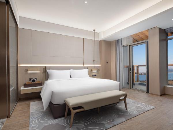 Wonderland Hotel Ningbo International Conference Center : photo 1 de la chambre suite supérieure - vue sur lac