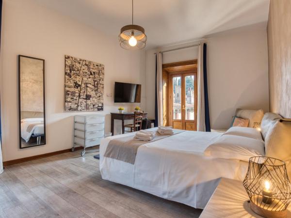 Palazzo Rivola : photo 8 de la chambre chambre familiale avec salle de bains privative séparée