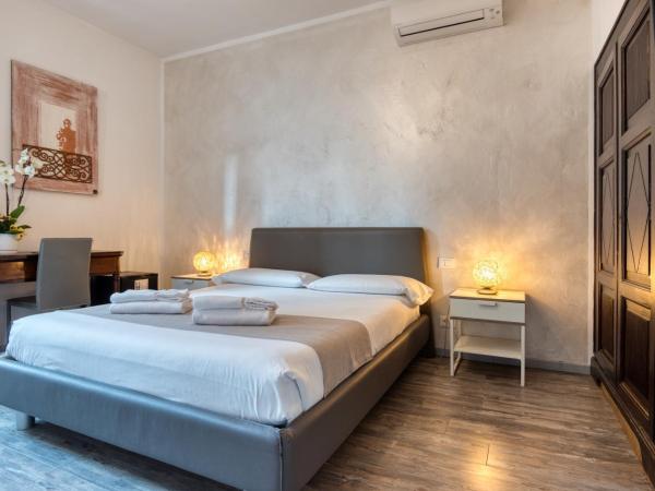 Palazzo Rivola : photo 1 de la chambre chambre double avec salle de bains privative - vue sur jardin