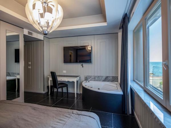 Partenope Relais : photo 1 de la chambre chambre de luxe double ou lits jumeaux avec baignoire spa