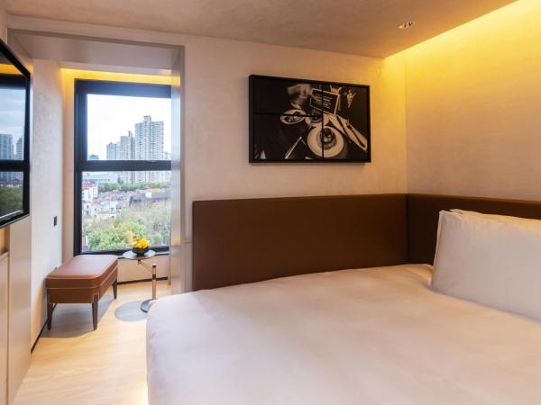 Mia Hotel - Shanghai Shaanxi South Road : photo 2 de la chambre delicate single bed with city view