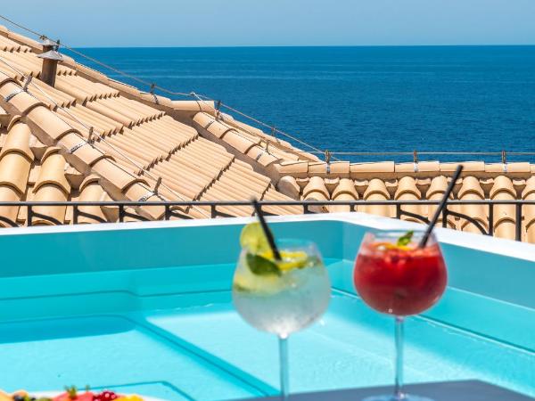 Villa Orabelle : photo 3 de la chambre chambre exécutive avec terrasse et jacuzzi - vue sur mer