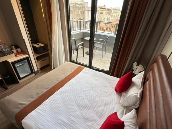 Edition Old City Hotel : photo 3 de la chambre chambre lit king-size deluxe avec balcon