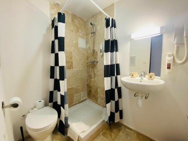 Enzo Hotels Limoges Centre Jourdan by Kyriad Direct : photo 2 de la chambre hébergement standard - 1 lit double