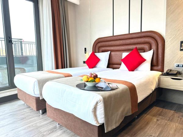 Edition Old City Hotel : photo 2 de la chambre chambre lits jumeaux deluxe avec balcon