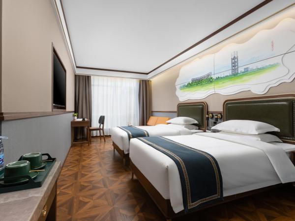 Time Traveller Boutique Hotel - Near National Olympic Sports Center , Beijing National Stadium , Olympic Forest Park , China Ethnic Museum, Guanzhuang subway station, Free laundry, Free customized tour itinerary : photo 4 de la chambre deluxe executive double room(for mainland chinese guests only)