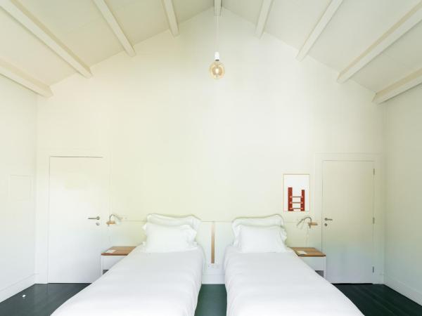 Duas Portas Townhouse : photo 2 de la chambre chambre triple - vue sur jardin