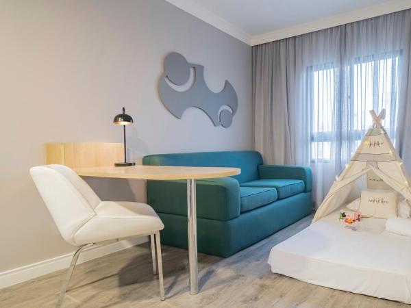 Mercure Sao Paulo Pinheiros : photo 2 de la chambre suite exécutive avec 1 lit queen-size