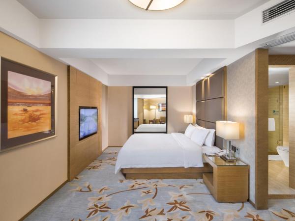 The LA Hotel 新世界伟瑞酒店 : photo 2 de la chambre chambre lit queen-size 