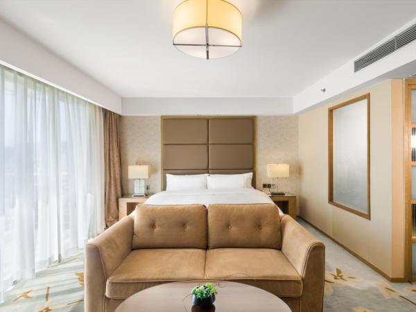 The LA Hotel 新世界伟瑞酒店 : photo 3 de la chambre chambre lit queen-size 