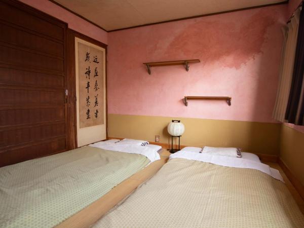 Guesthouse Bon : photo 3 de la chambre chambre lits jumeaux Économique