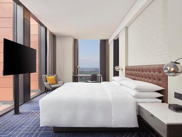 Four Points by Sheraton Tianjin National Convention and Exhibition Center : photo 5 de la chambre chambre lit king-size supérieure