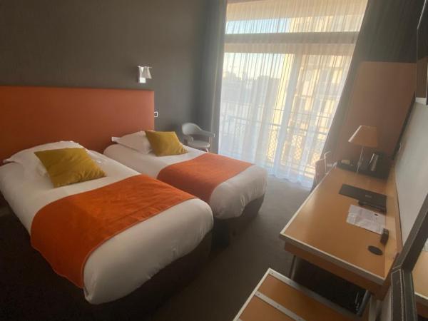 Hotel Des Lices : photo 2 de la chambre chambre lits jumeaux