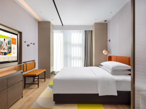 Home2 Suites by Hilton Chongqing Yubei : photo 1 de la chambre chambre supérieure lit queen-size