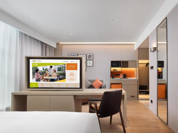 Home2 Suites by Hilton Chongqing Yubei : photo 1 de la chambre chambre lit queen-size deluxe