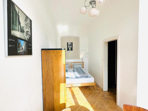 Jacob Brno : photo 7 de la chambre chambre quadruple avec salle de bains commune