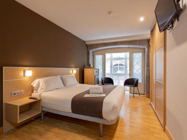 Casual Arriaga : photo 2 de la chambre chambre double deluxe avec balcon