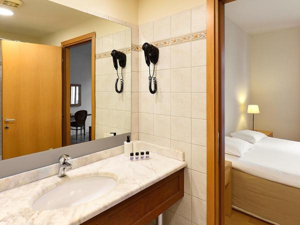 Le Palace Hotel : photo 9 de la chambre chambre familiale (3 adultes + 1 enfant)