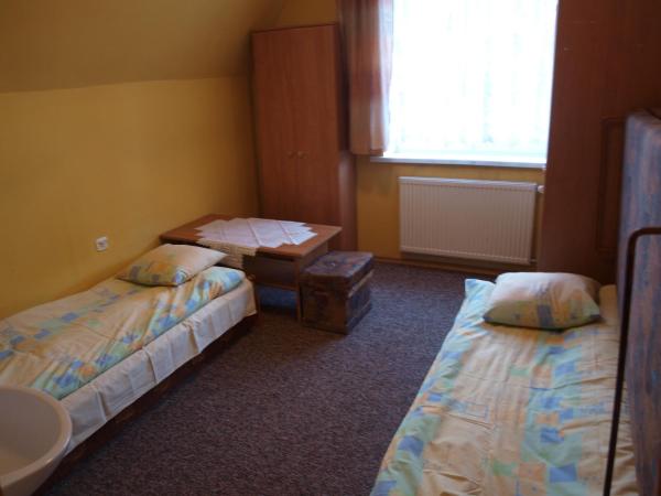 Pokoje Gościnne Żak : photo 1 de la chambre chambre lits jumeaux avec salle de bains commune