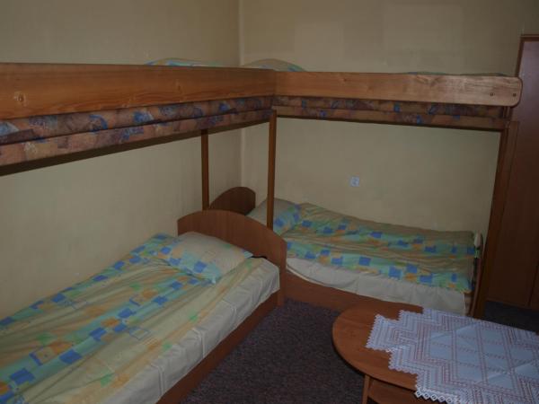 Pokoje Gościnne Żak : photo 1 de la chambre chambre quadruple avec salle de bains commune