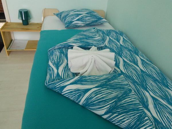 Pokoje Gościnne FRESCO : photo 9 de la chambre chambre quadruple avec salle de bains commune