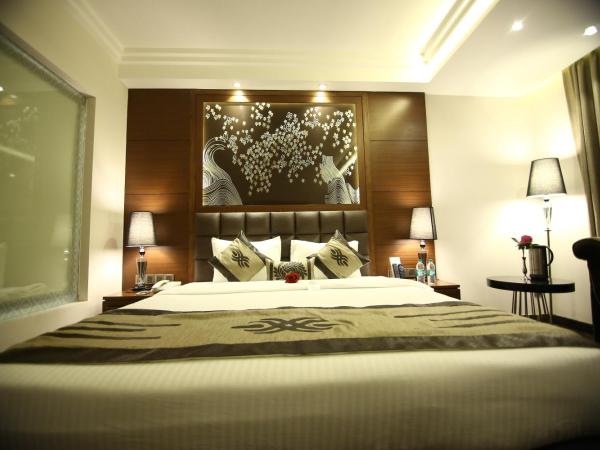 Hotel JRD Exotica-Business Hotel : photo 1 de la chambre deluxe double room with complimentary hi tea from 04pm till 06pm